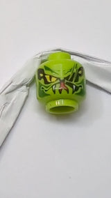 Minifigur, Kopf einer außerirdischen Schlange mit großen gelben Augen mit schwarzen Schnittnarben, dunkelgrünen Markierungen, Maul mit weißen Reißzähnen und rotem, gespaltenem Zungenmuster lindgrün