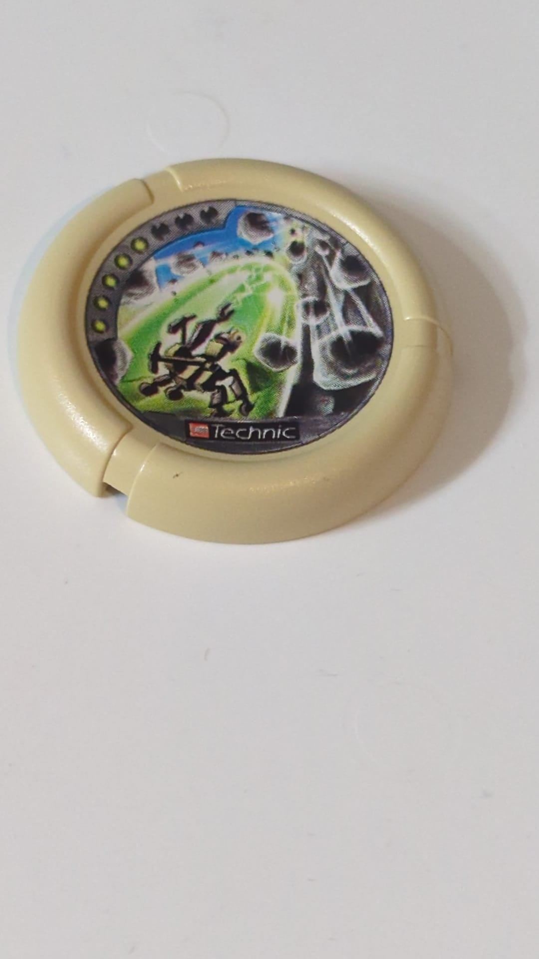 Wurfscheibe Disk mit Throwbot-Granite-/Slizer-Rock-Motiv (5 Punkte), LEGO Technic Logo und Roboter-Schutzschild-Muster (fallende Felsen) beige