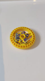 5x5 Technik Disk – RoboRider-Talisman-Rad, Greif-Form mit Robotermuster gelb