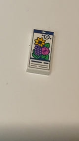 NEU 1 x 2 Fliese mit Samenpäckchen-Motiv (dunkelblaue Linien; Blumen in hellem Hellorange, Dunkelrosa und mittlerem Lavendel; hellgrüne Blätter) weiß