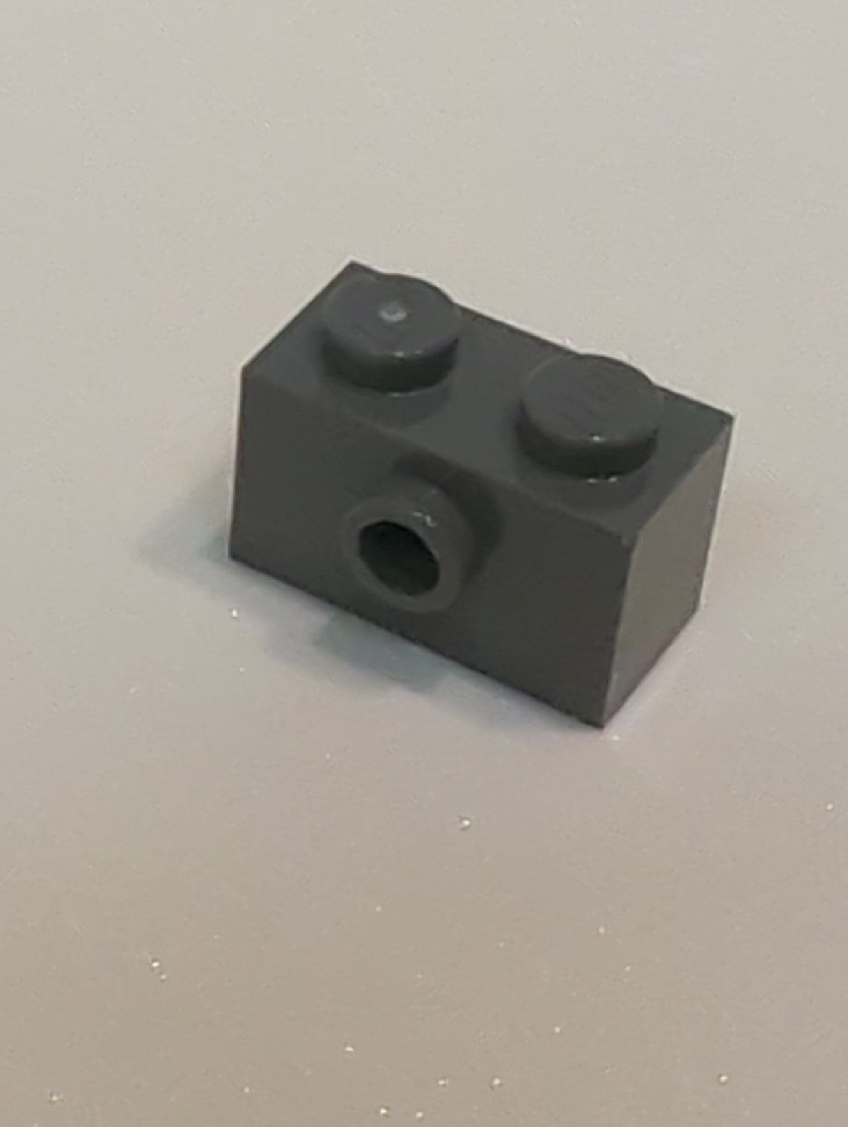 NEU Stein, modifiziert 1 x 2 mit Noppe an einer Seite neudunkelgrau