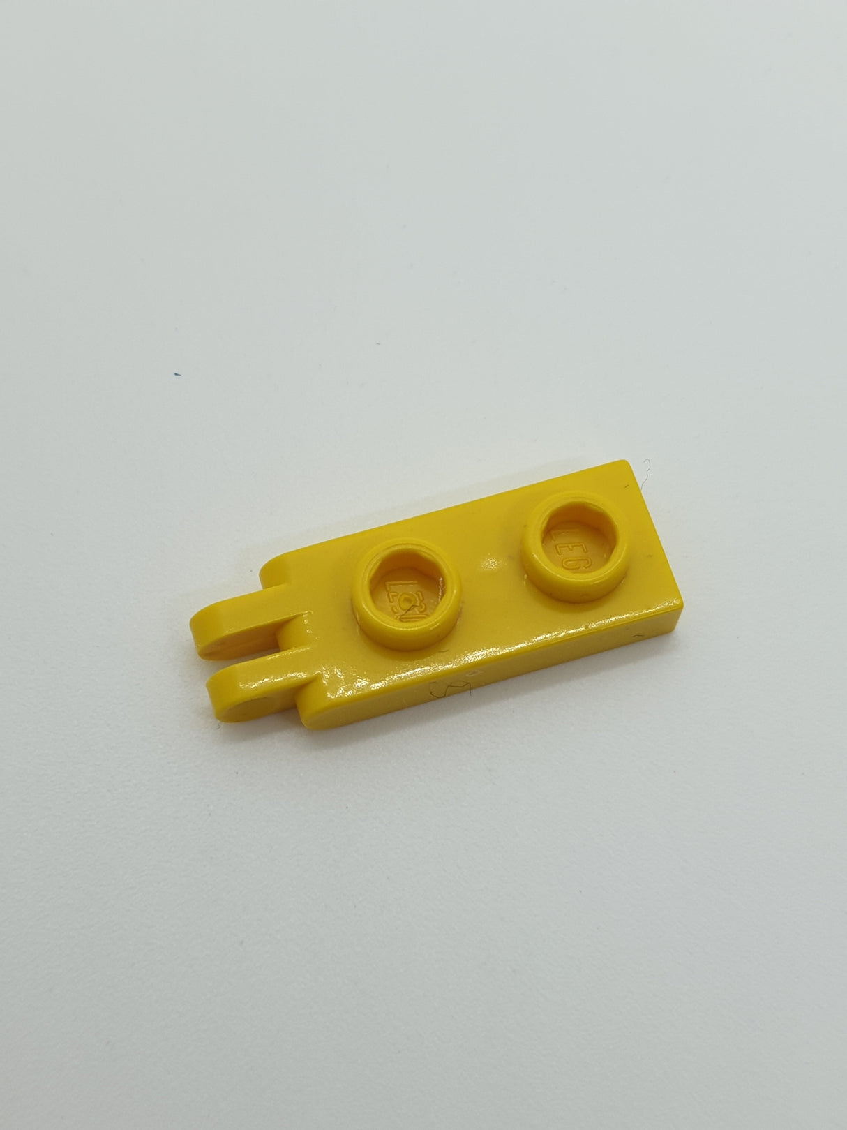 1x2 Scharnierplatte 2 Finger geschlossene Noppen gelb