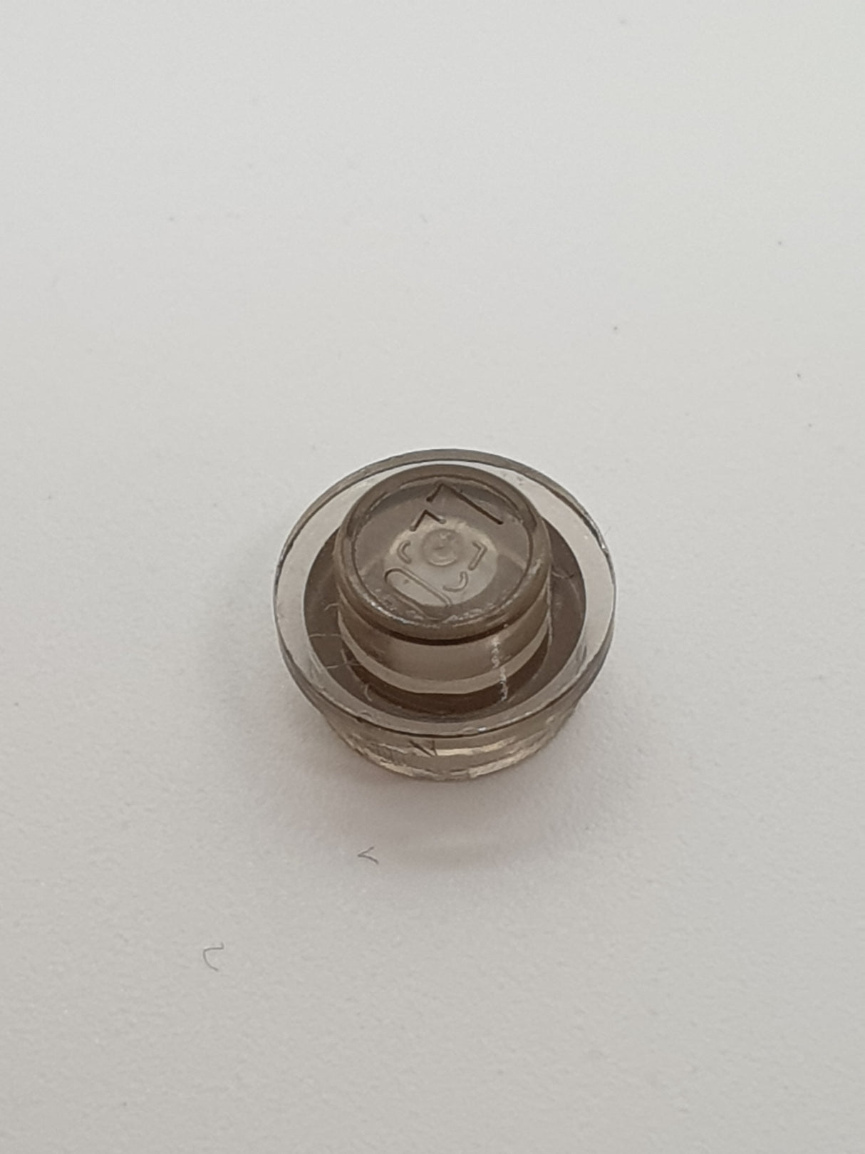 1x1 Rundstein flach transparent braun (alt: schwarz)