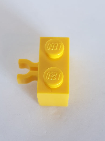 1x2 modifizierter Stein mit O-Clip vertikal gelb