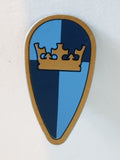 Schild bedruckt Oval mit goldener Krone auf blauem Grund