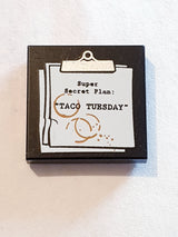 2x2 Fliese bedruckt with Clipboard with 'Super Secret Plan: "TACO TUESDAY"' and Coffee Stains Pattern